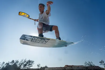 Kiter in a jump with the board vertical, Malibu spot