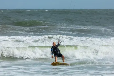 Kitesurfing along the red dunes of Malibu, Mui Ne