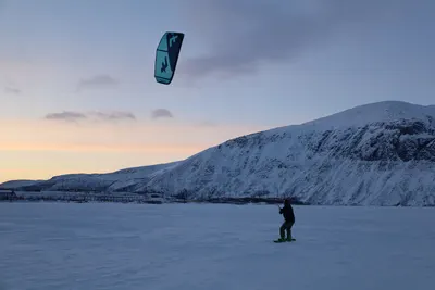 Sunset over the snow plain, snowkiting in the Khibiny mountains