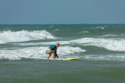 K1 student riding a wave in Mui Ne