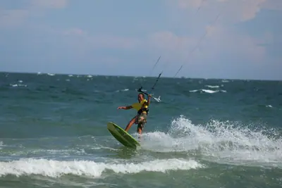 A kite jump off a wave in Mui Ne