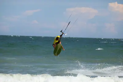 A kiter on the wave, Sandunes beach, Mui Ne