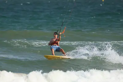 A kiter on the wave, Sandunes beach, Mui Ne