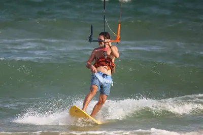 A kiter on the wave, Sandunes beach, Mui Ne
