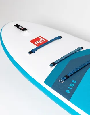 Red Paddle Co 10'8" Ride MSL Inflatable Paddle Board Package. Inflatable SUP board — side view