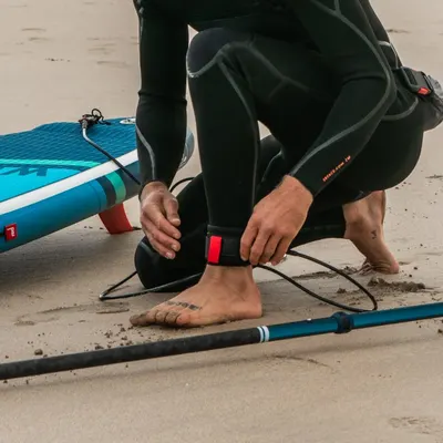 Red Paddle Co 10ft Board Leash - Surf Leash — in action on the water