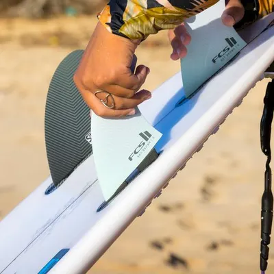 Softech FCS II Sky Brown Tri Fins Fins — in action on the water