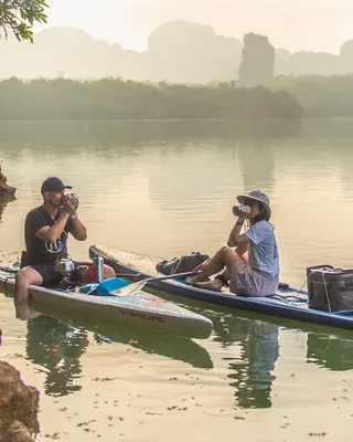 SUP-доска Starboard Touring Paddleboard — в работе на воде